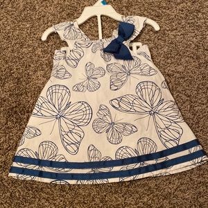 White with blue butterfly dress